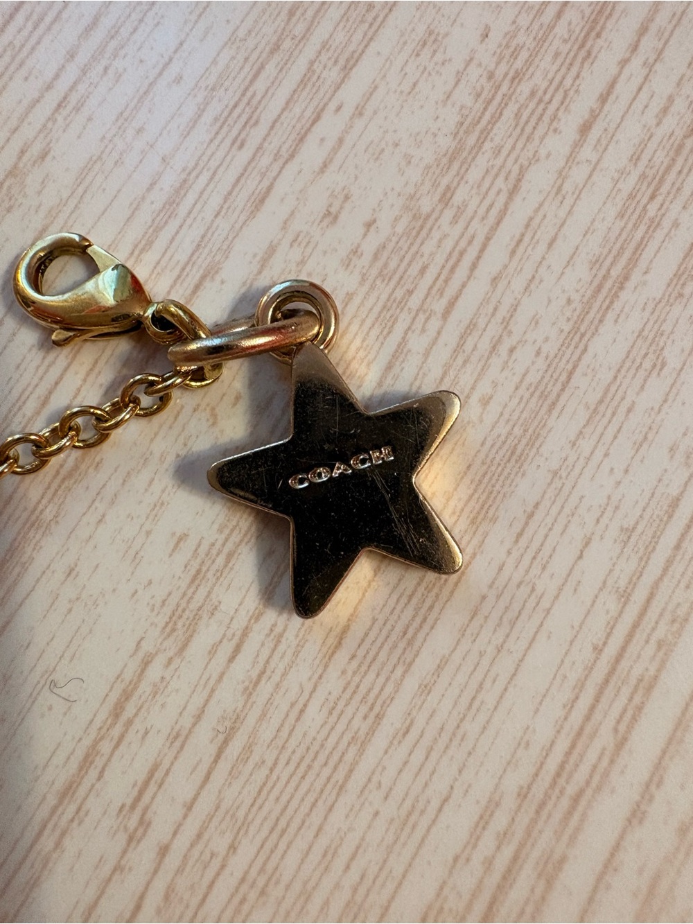 Coach Gold Star Charm Bracelet